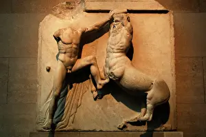 Parthenon: Parthenon. Metope XXVI. A centaur is raised to strike a Lapi