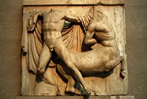 Parthenon: Parthenon. Metope XXVII. A centaur, pressing a wound in the