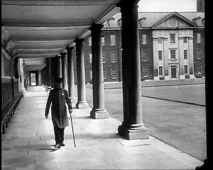 Pensioner: Partial View Across a Courtyard to One of the