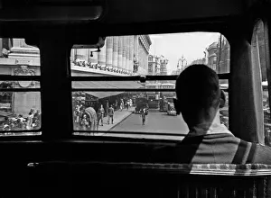 Harrods: Passenger on bus approaching Harrods store, London