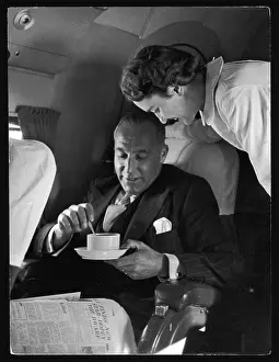 Swissair: PASSENGER TAKES A COFFEE
