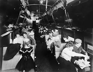 Usz62: Passengers in an American Pullman railroad ?