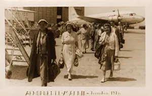 Disembarked: Passengers disembarking at Madrid Airport