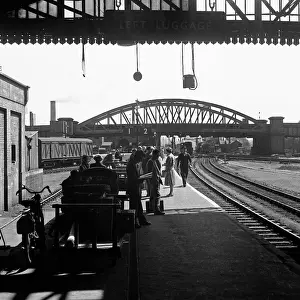 Peterborough: Passengers on platform, Peterborough North station