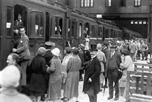 Travelers: Passengers on a platform of a train station in Berlin