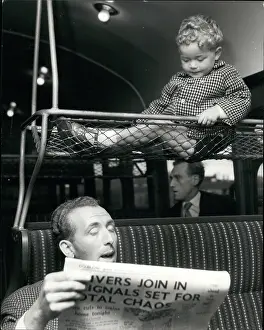 Passengers in a railway carriage