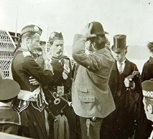 Pipers: Passengers waiting to board a boat