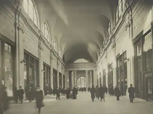 Beaux Arts: Passengers walking through a hallway of Pennsylvania