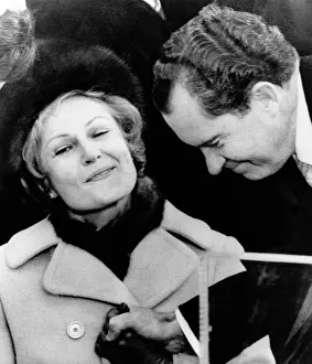 Grasps: Pat Nixon grasps her husband's hand after ?