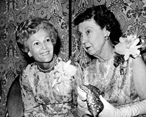 Biennial: Pat Nixon and Mamie Eisenhower talking to ?
