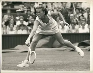 Versus: Pat Ward in tennis match at Wimbledon