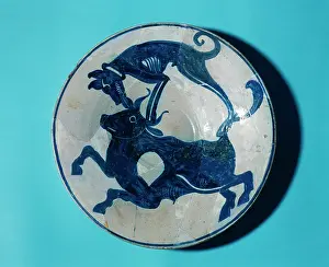 Dish: Paterna ceramic style. Blue plate. Dog attacking a bull. 15t