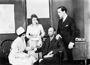 Sickly: Patient and two nurses attending him and a friend