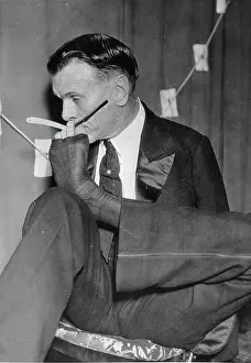 Shaves: Paul Desmuke shaves with his left
