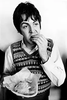 Mccartney: Paul McCartney of The Beatles eating chips during break