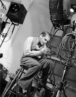 Nellie: Paul Muni during the filming of Hi, Nellie, 1934