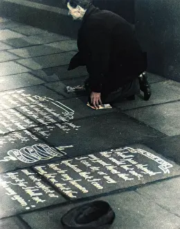Kneels: Pavement artist 1930s