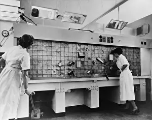 Isotopes: Peaceful use of atom. Two female technicians ?