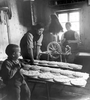 Tyrolean: Peasant woman baking bread, 1939