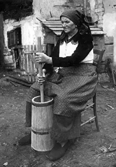 Churning: Peasant woman while buttering, 1936