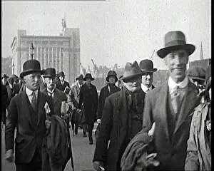 Commuters: Pedestrians And Commuters Crossing London Bridge