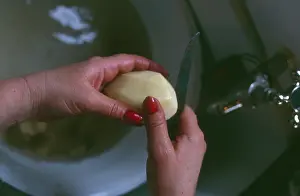 Nail: PEELING POTATOES 1940S