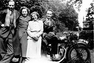 Foursome: Four people with a 1936 BSA motorcycle