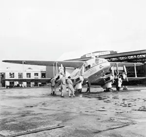Puddles: People alongside a passenger plane, Croydon Aerodrome