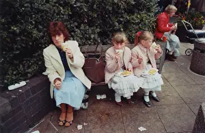 Twins: People on benches, Stockport