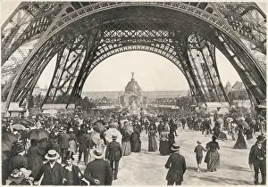 Universelle: People beneath Eiffel Tower, Paris - Exposition Universelle