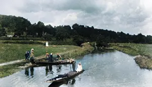 Punting: People boating on a river