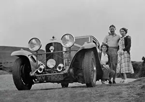 Headlamps: Three people with a car