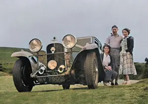 Headlamps: Three people with a car