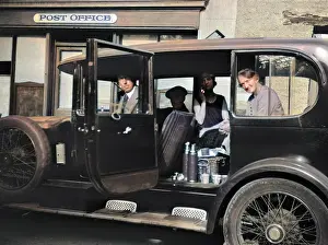 John Maclellan: Four people in a car outside a Post Office