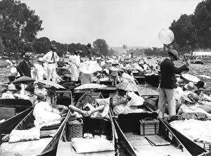 Henley: People at a crowded regatta on the River Thames