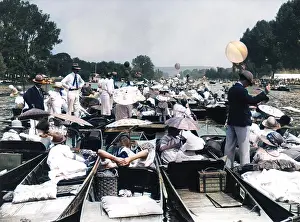 Henley: People at a crowded regatta on the River Thames