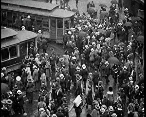 British Pathé Ltd: People Crowding Around, and Climbing On Top