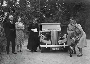 Cassock: People with dog and car