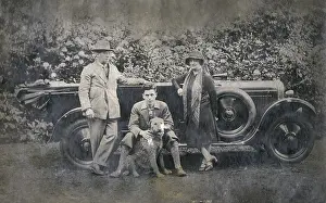 Fours: Three people with dog and car