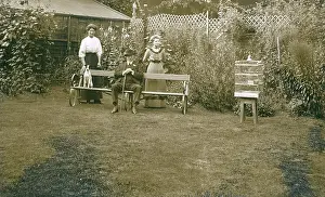 Trellis: Three people with a dog in a garden