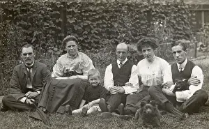 Blouses: Six people and two dogs in a garden