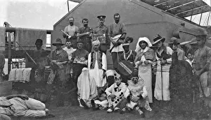 Crawfords: People in fancy dress on the deck of a ship