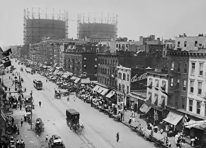 Tenements: People gathered on right side of the street