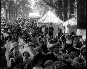 Marquees: People Gathering and Relaxing at a Fairground