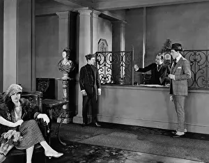 Interactions: People in hotel lobby