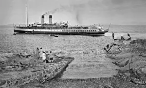 Shingle: People on jetty watching a steamer