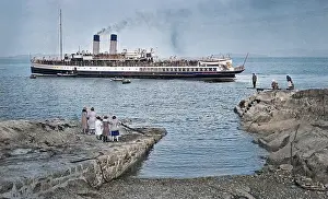 Shingle: People on jetty watching a steamer