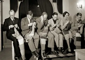 Six people knitting scarves
