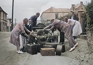 People loading a car at Perranporth, Cornwall