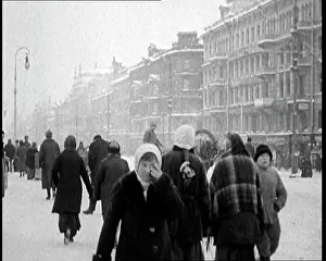 Milling: People Milling Through Snow Covered Streets